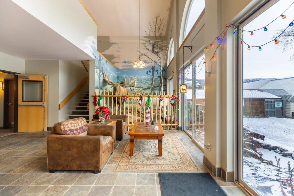 Lodge lobby interior with seating at Chena Hot Springs Resort