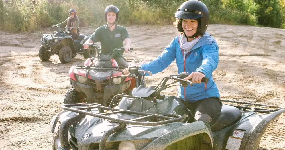 A group of people riding ATVs at Chena